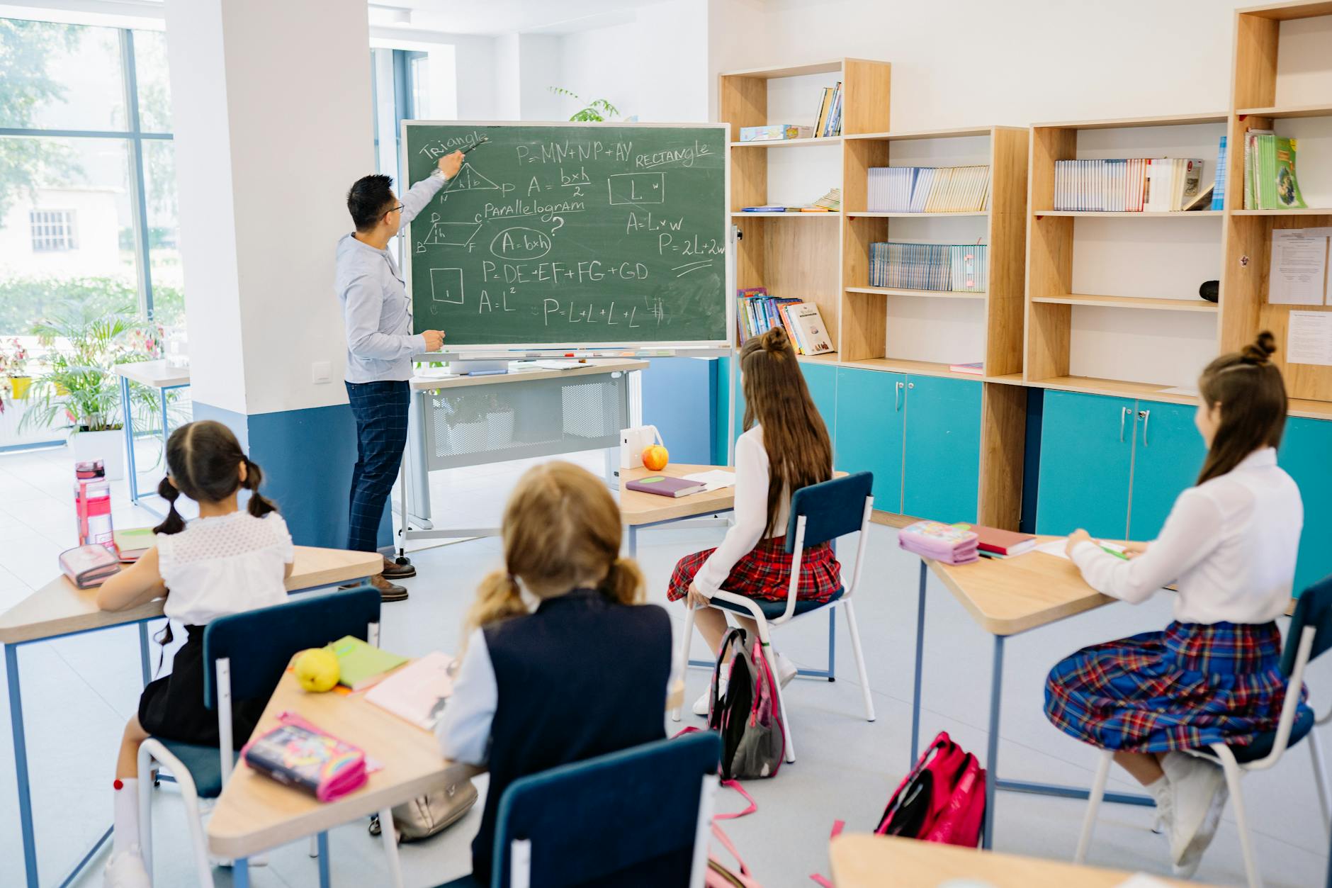 students and teacher in a classroom